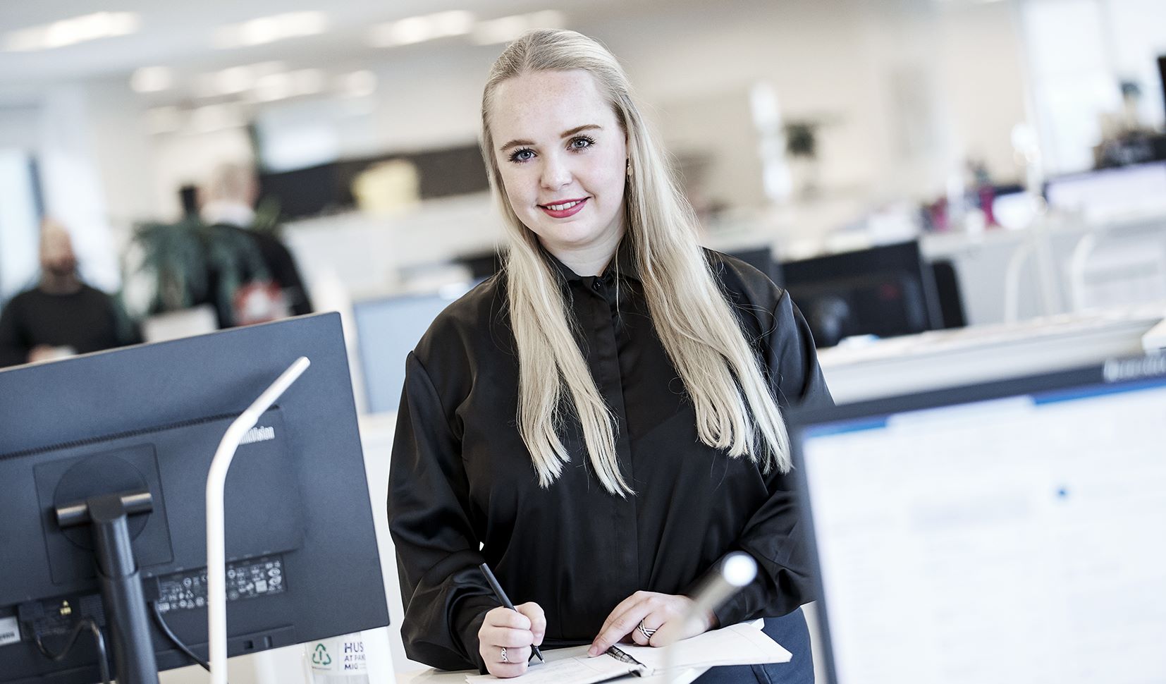 maria at her desk